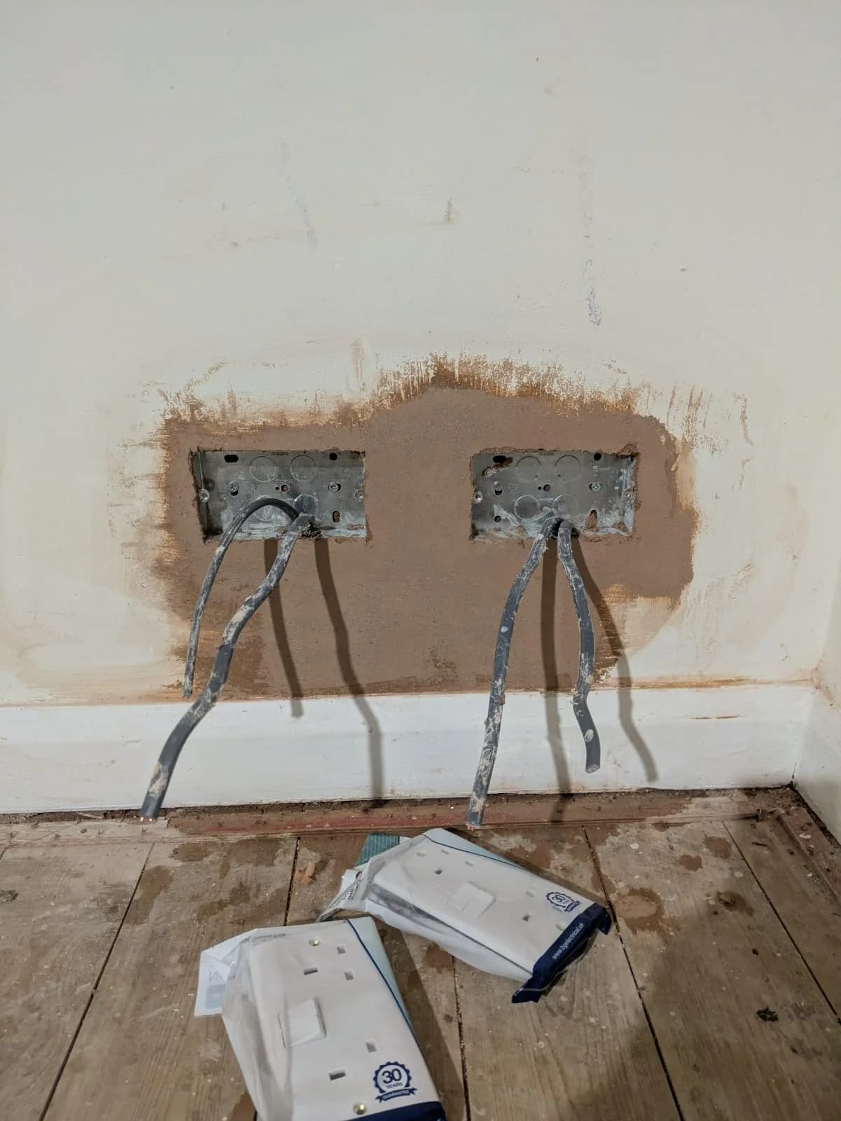 Close-up of back boxes and new cabling during rewire